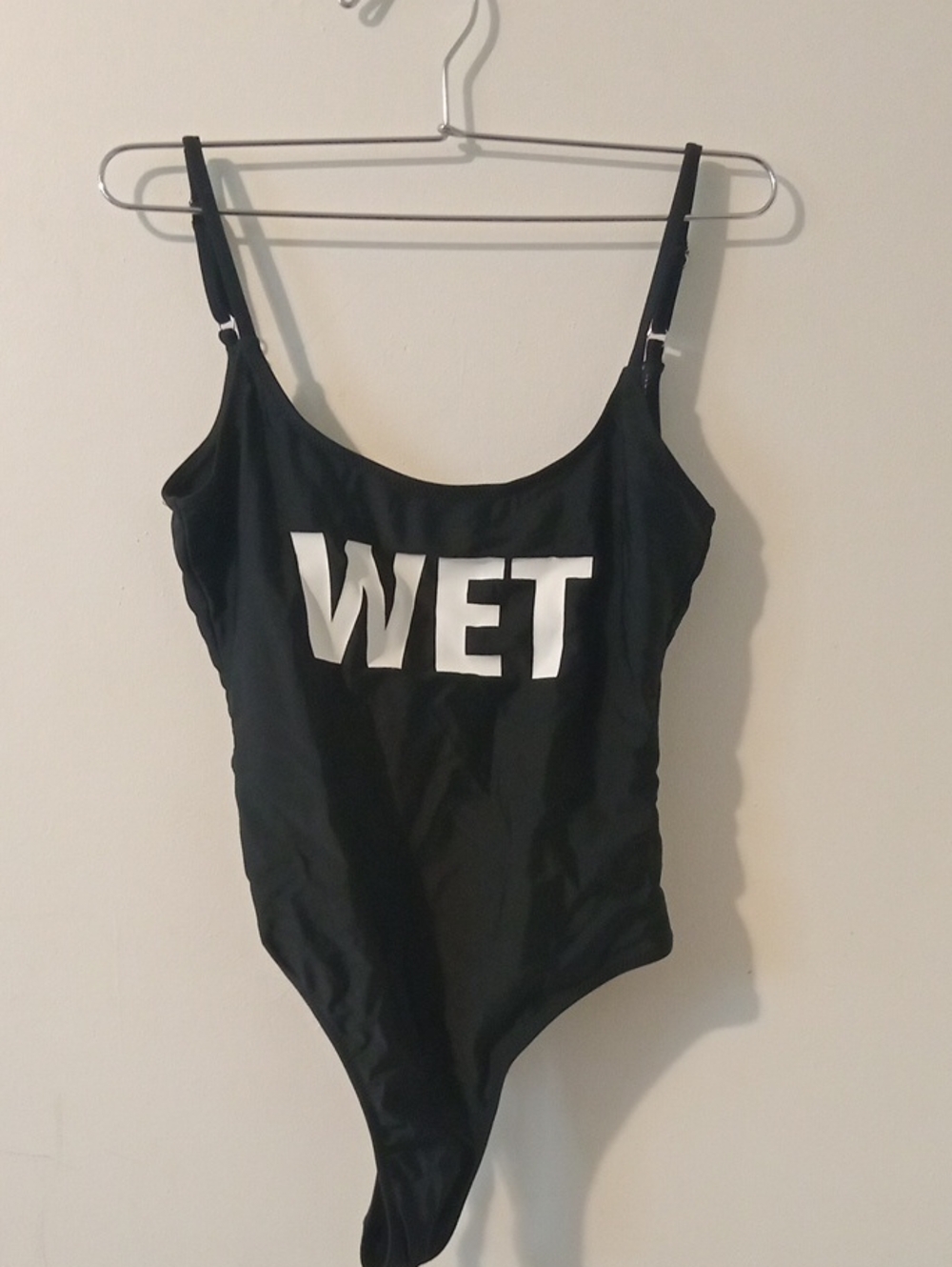 Missguided Black One-Piece Swimsuit with White 'WET' Graphic